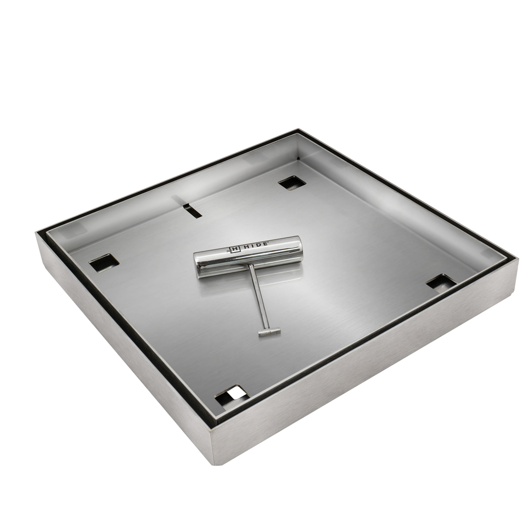 HIDE Stainless Steel Drain Cover hardware with HIDE Safety Key sitting in the lid