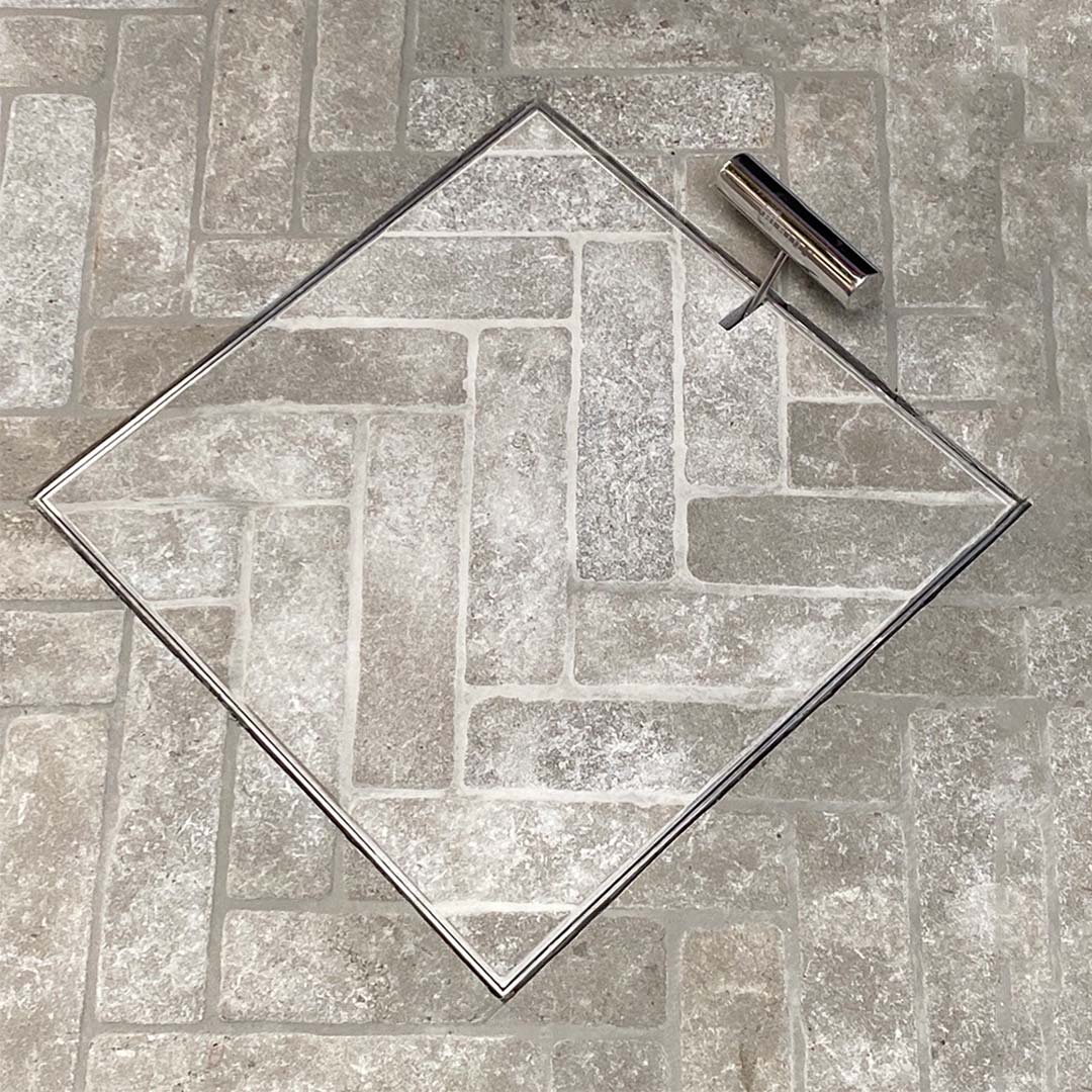 HIDE stainless steel Manhole Cover with herringbone tile pattern